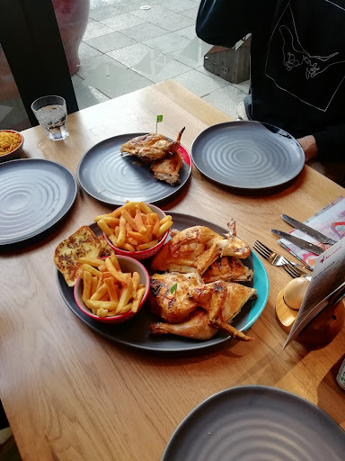 Photo of Nando's Cheltenham - Unit 2, The Brewery Quarter, St Margaret's Rd, Cheltenham GL50 4EQ